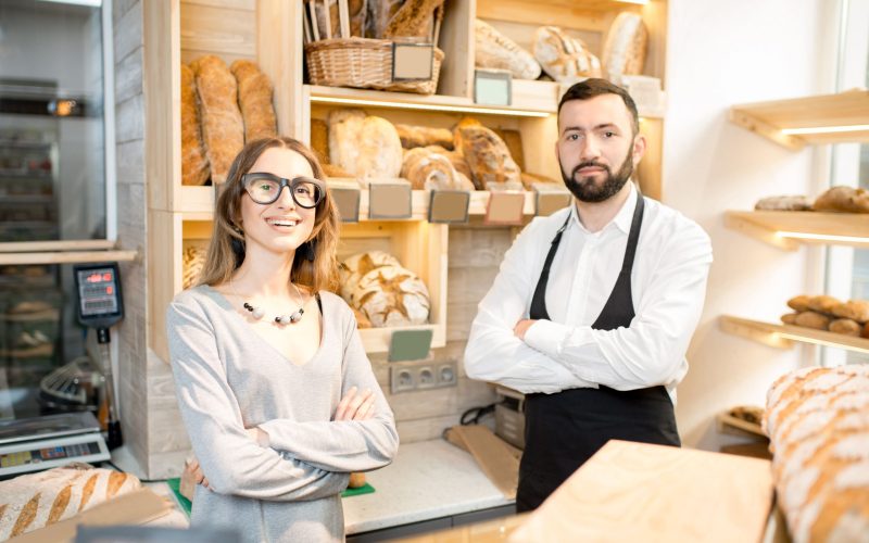 owner-of-the-bakery-store-with-bread-seller-2021-12-14-21-48-42-utc (1)